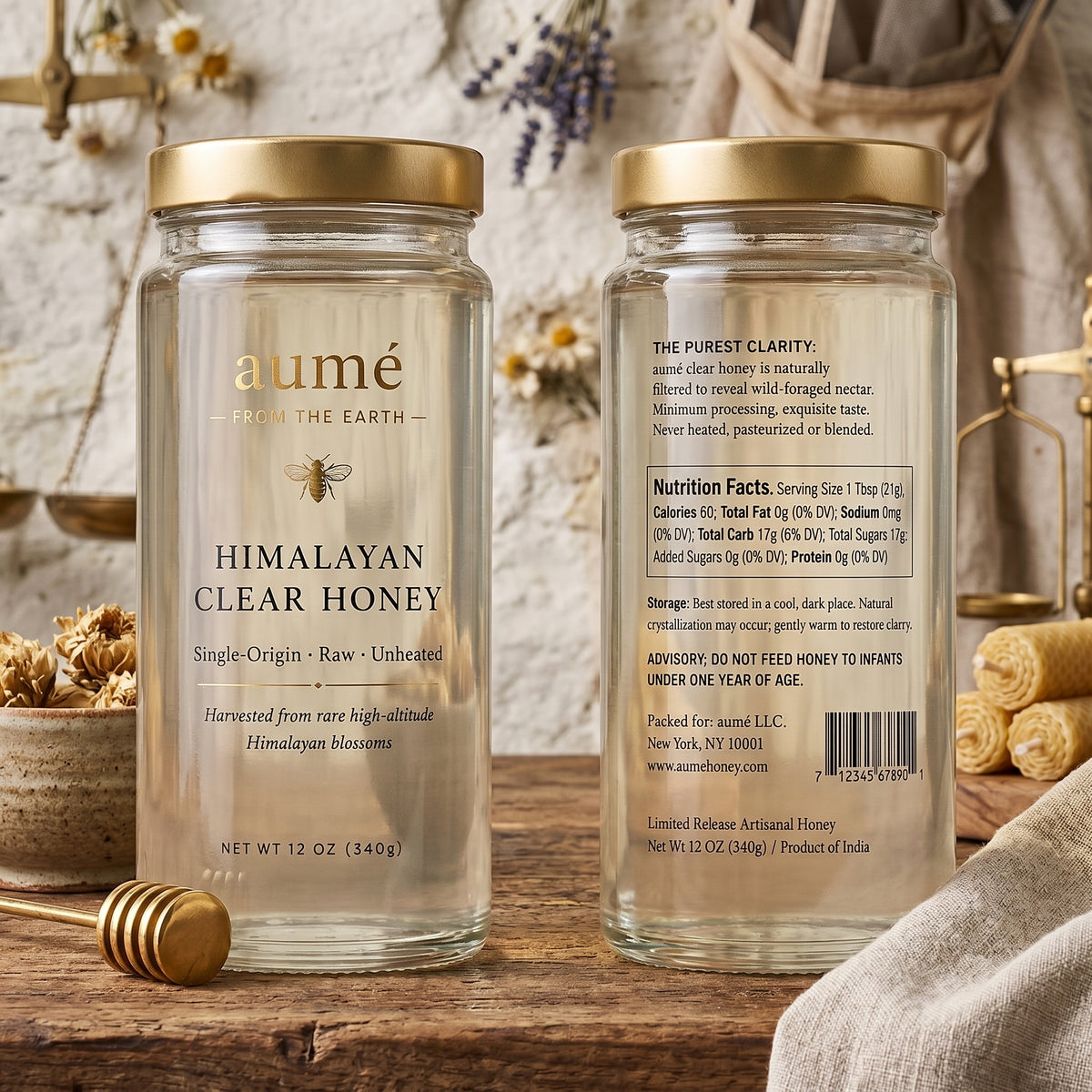 Front and back of Aumé raw Himalayan clear honey jars showing label and nutrition facts, with honey dipper and dried flowers